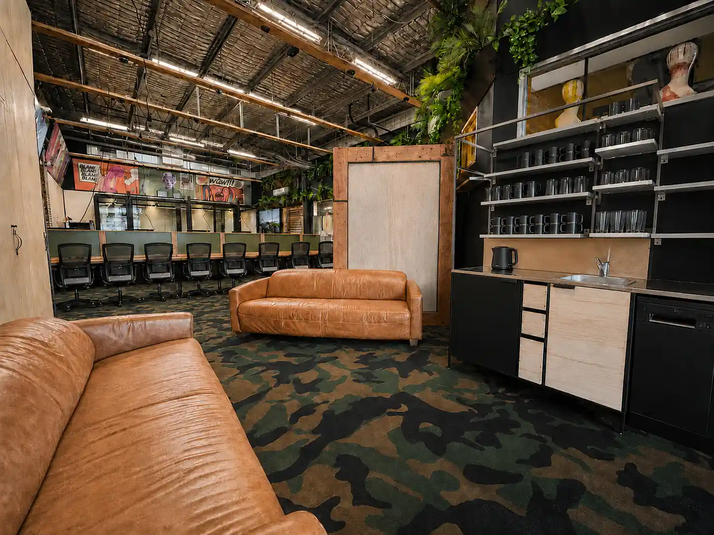 Breakout lounge and kitchenette within the DeskPlex corporate headquarters in Hawthorn, offering larger teams an informal space to relax, collaborate and recharge alongside their dedicated private office workspace.