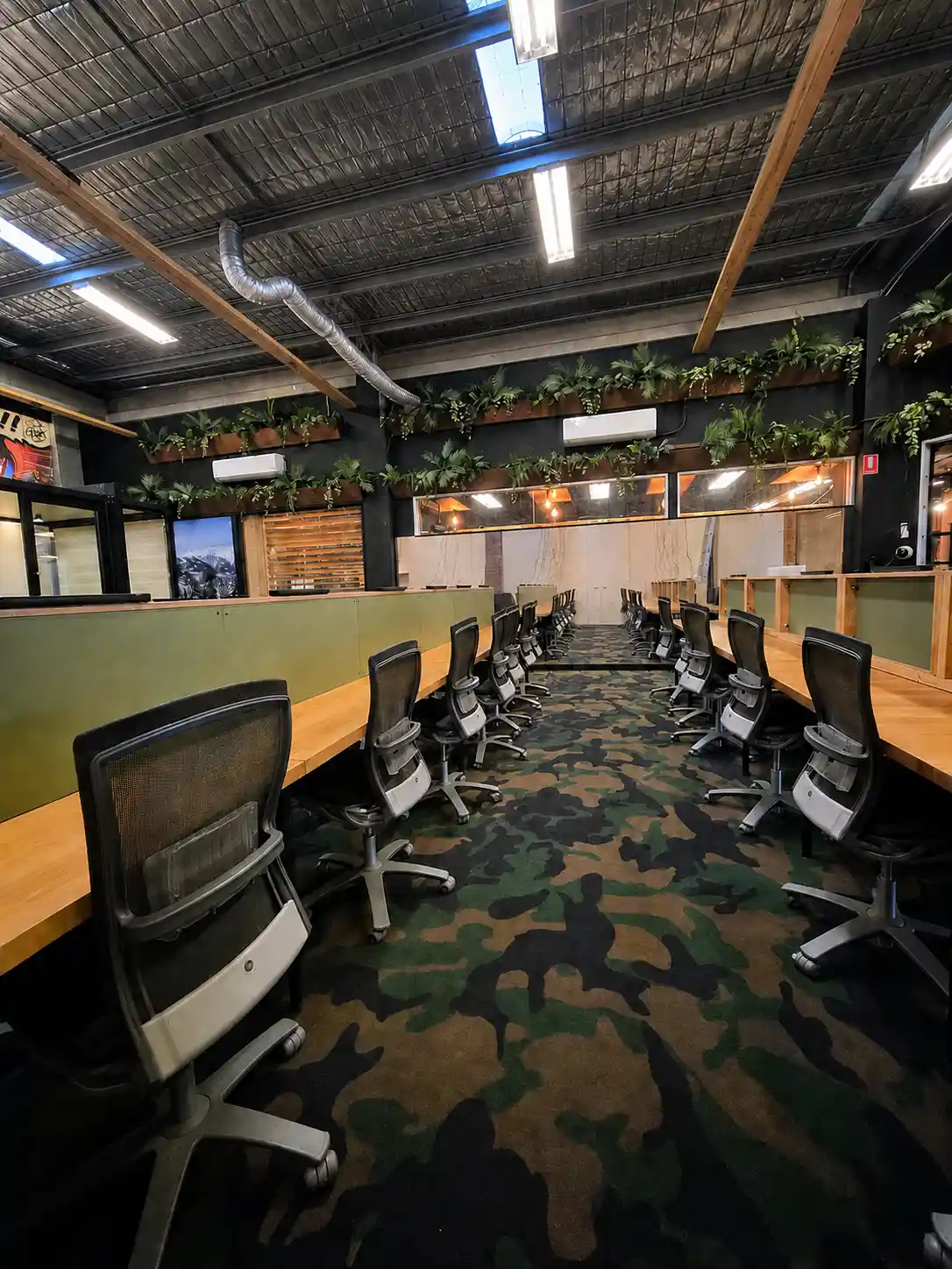 Large open-plan workstation area inside the DeskPlex Executive Headquarters in Hawthorn, providing a fully furnished private office environment designed for larger teams and businesses seeking flexible corporate office space near Richmond, Abbotsford and Melbourne CBD.