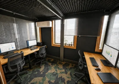 Fully furnished private office at DeskPlex Hawthorn with dedicated desks, monitors, natural light and air conditioning, providing a quiet workspace for small teams within DeskPlex’s flexible office environment near Richmond, Abbotsford and Melbourne CBD.