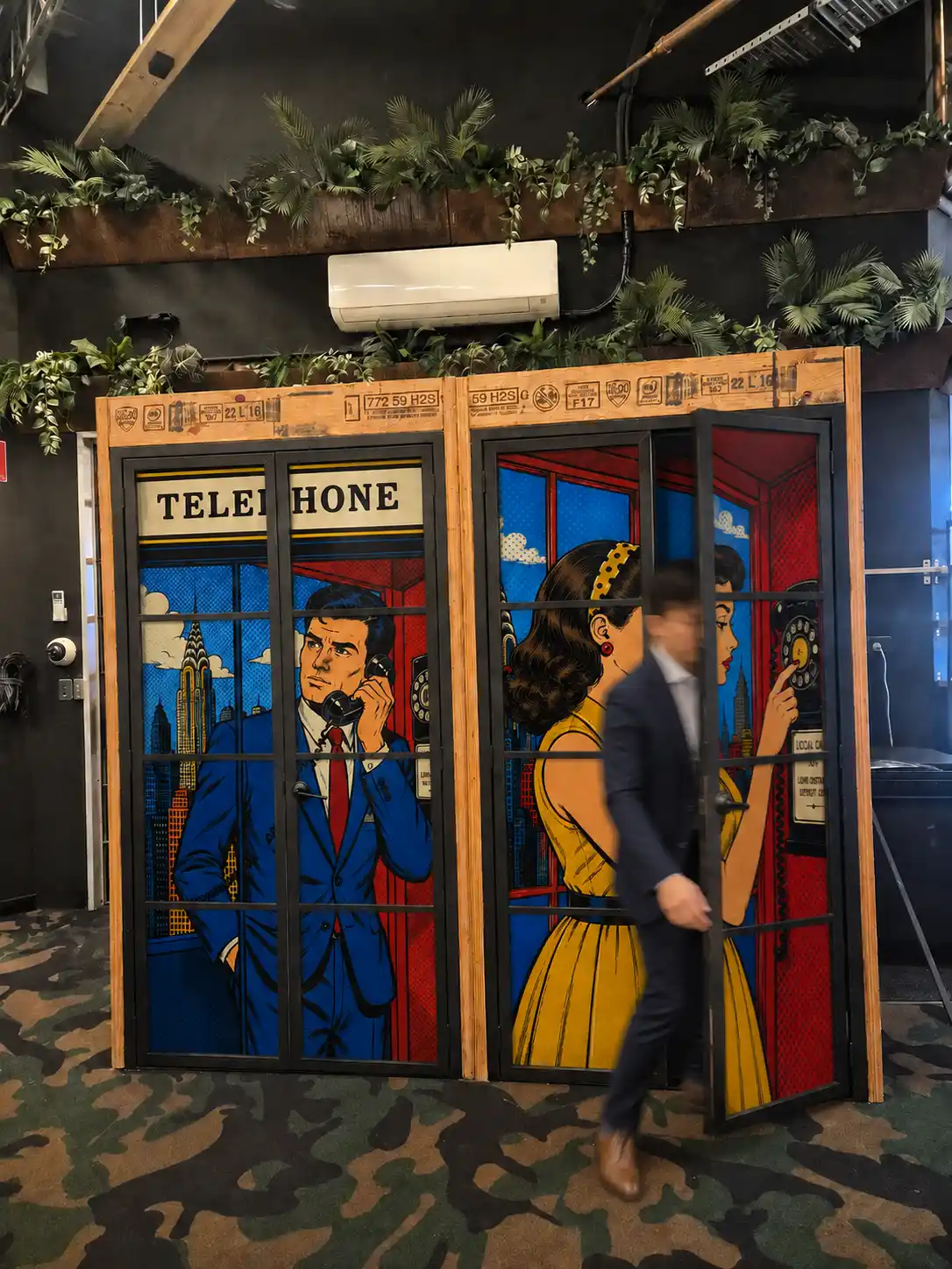 Dedicated private phone booths inside the DeskPlex Executive Headquarters in Hawthorn, giving team members quiet spaces for calls and video meetings within their standalone corporate office.