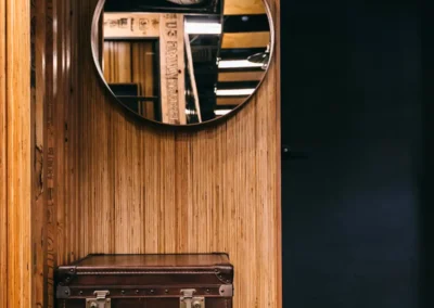 Interior detail at DeskPlex Hawthorn featuring warm timber finishes, custom furnishings and distinctive design elements that create a premium and individual workspace environment.